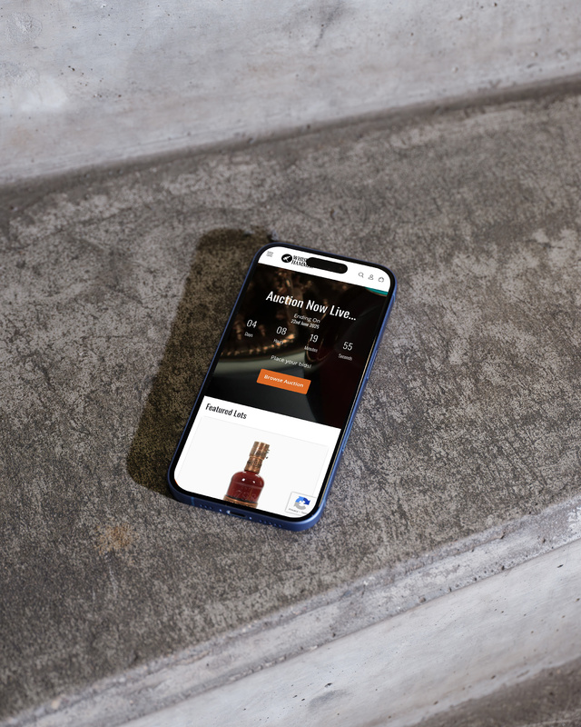 Whisky Hammer mobile auction application, featuring a secure and real-time bidding interface for rare whisky